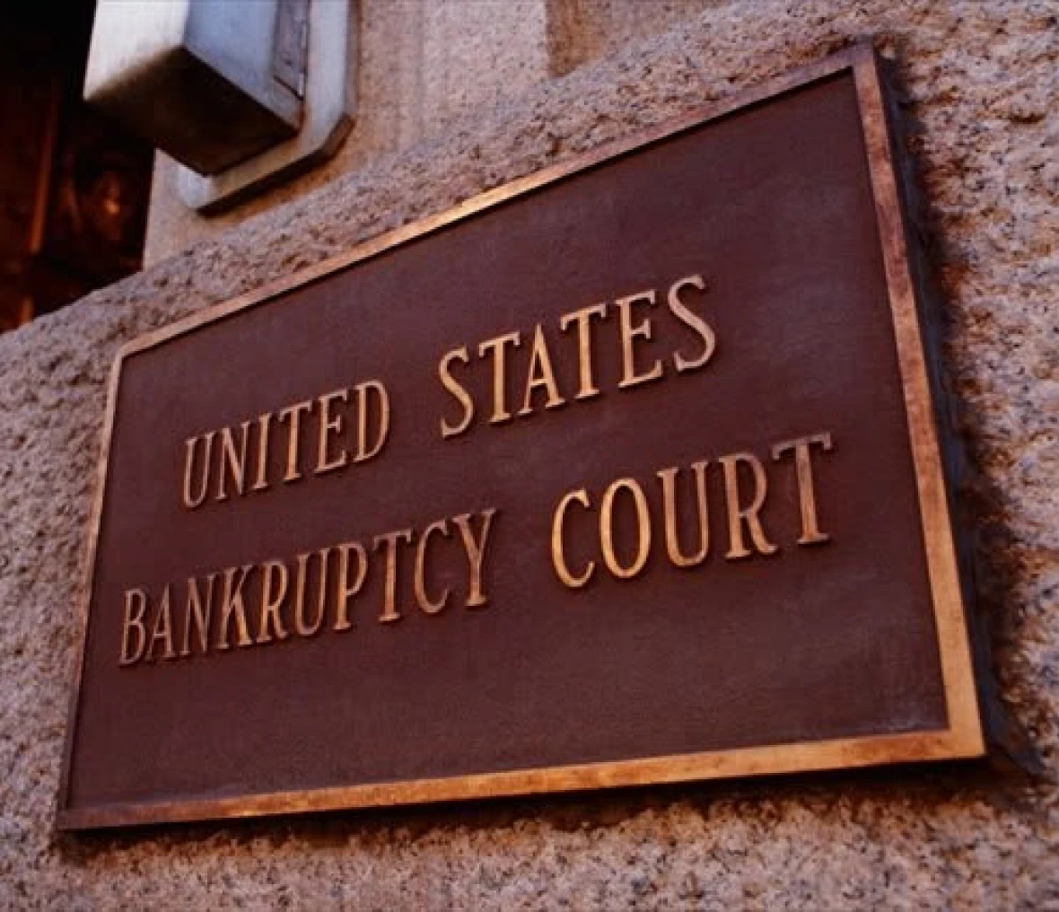 Bronze plaque on courthouse wall